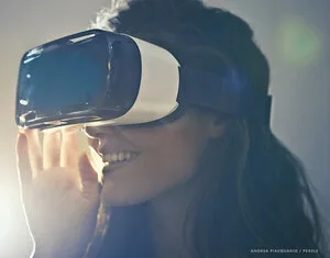 Smiling woman wearing a virtual reality headset