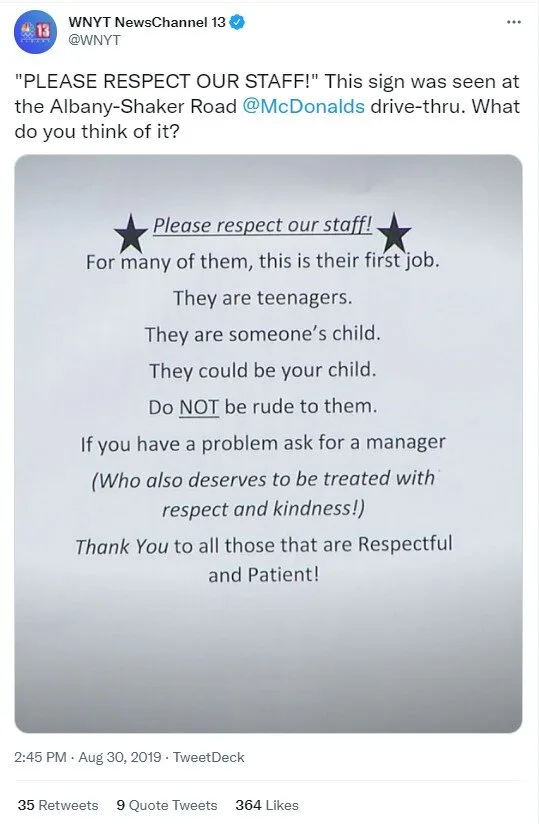 Tweet of a McDonald's drive-thru sign asking customers to respect its teenage staff