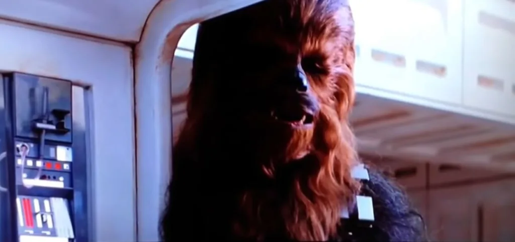 Chewbacca at the controls in a Star Wars film scene