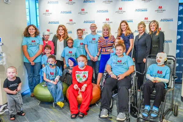 Dollywood representatives and patients at Monroe Carell Jr. Children's Hospital at Vanderbilt for a $1 million donation
