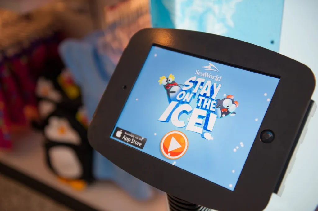 Tablet showing the title screen of the SeaWorld Stay On The Ice penguin retail game