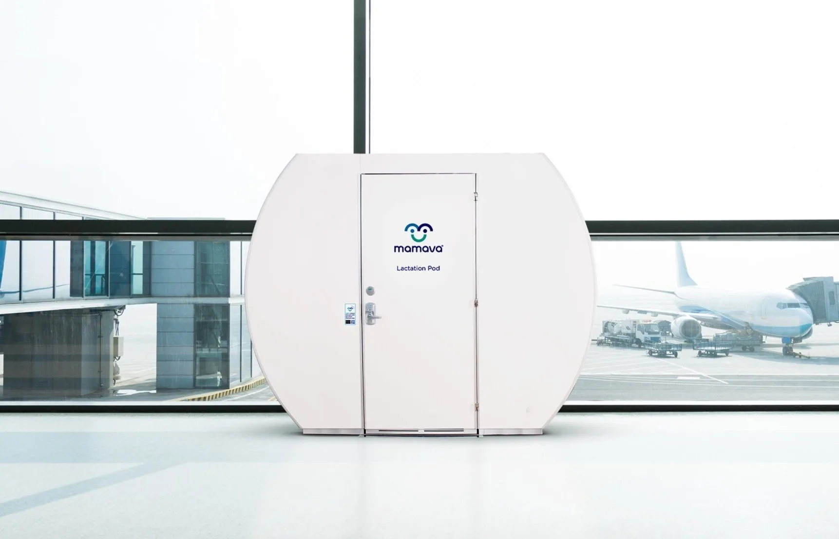Mamava lactation pod standing beside the windows of an airport terminal