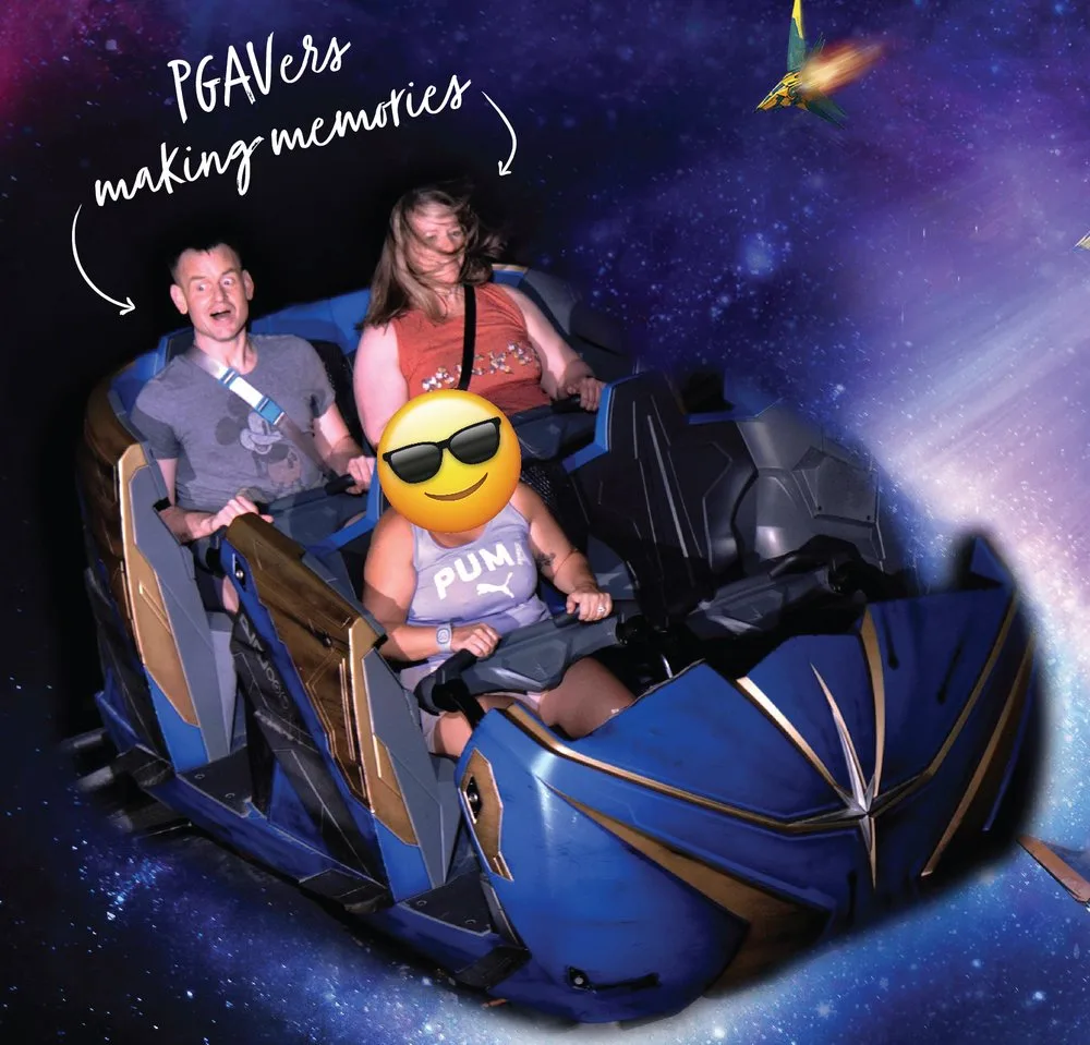On-ride photo of PGAV's Tyson and Dawn laughing aboard Guardians of the Galaxy: Cosmic Rewind