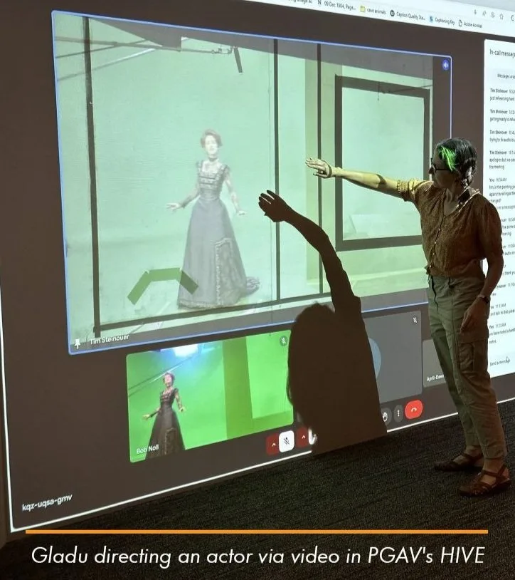 AD Gladu directing an actor via video on a large screen in PGAV's HIVE