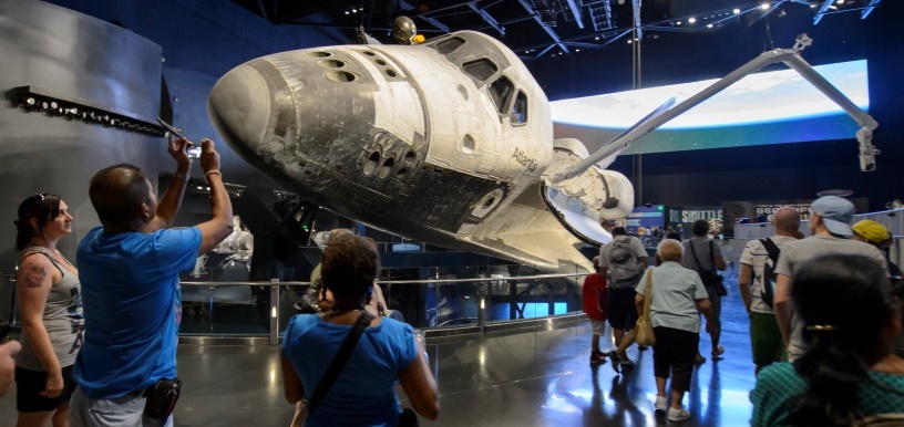 Nose-cone view of Space Shuttle Atlantis on display with its cargo bay doors open and Canadarm extended at the Kennedy Space Center Visitor Complex