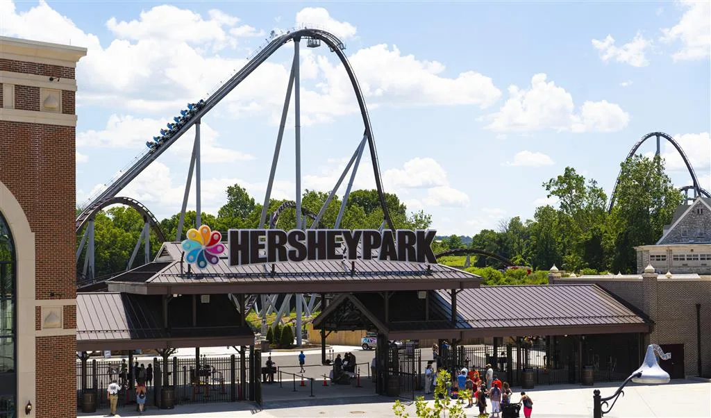 Hersheypark front gate with the Candymonium roller coaster rising behind the entrance