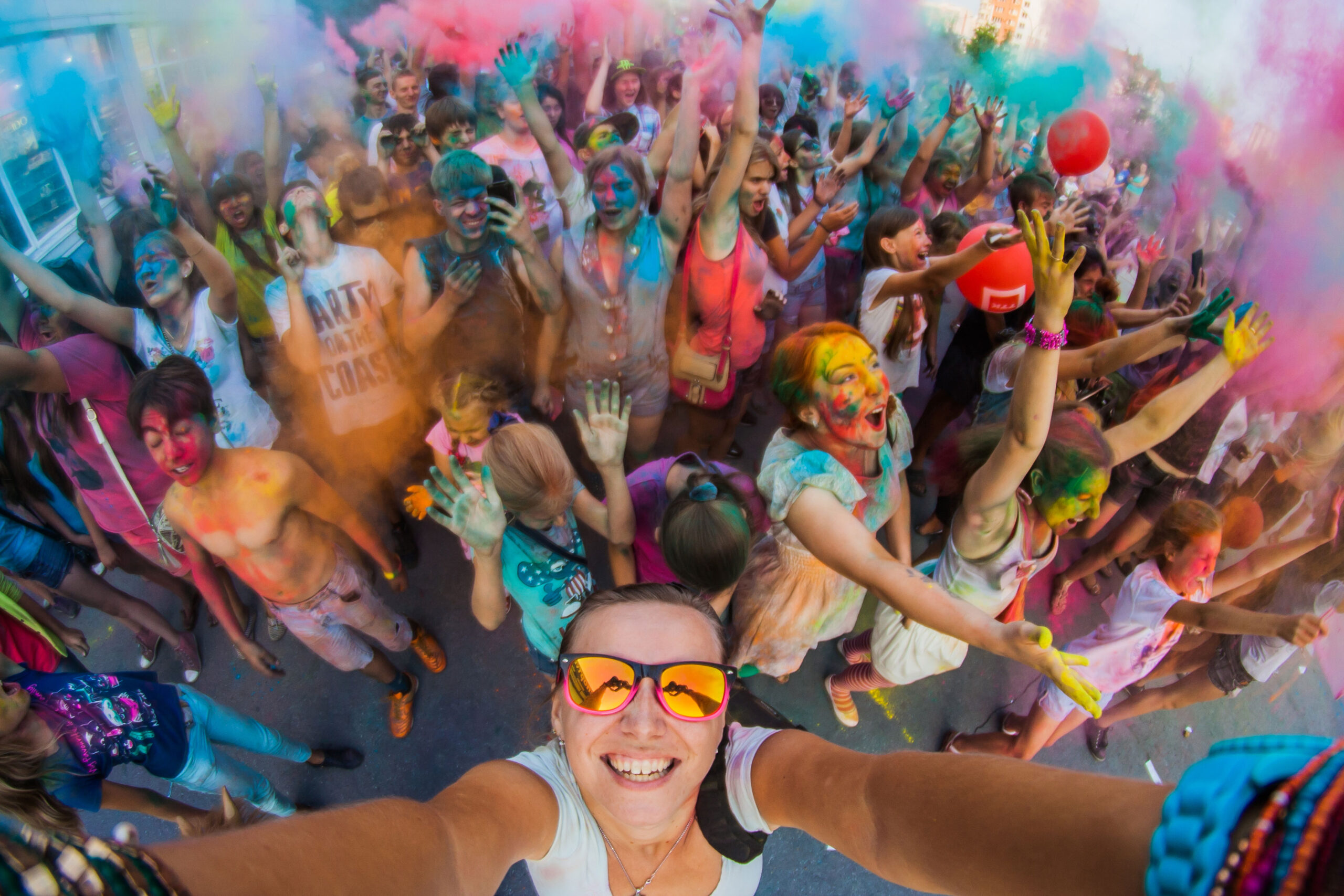 Cover of February 2018 Destinology, Fight for Attendance, people at Diwali or a Color Run