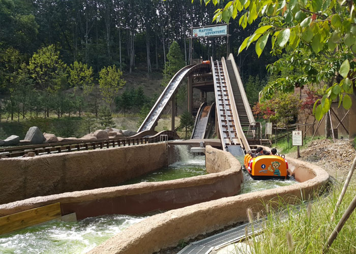 A yellow flume ride at Everland resort approaches its first hill