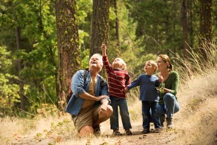A family hiking in the woods