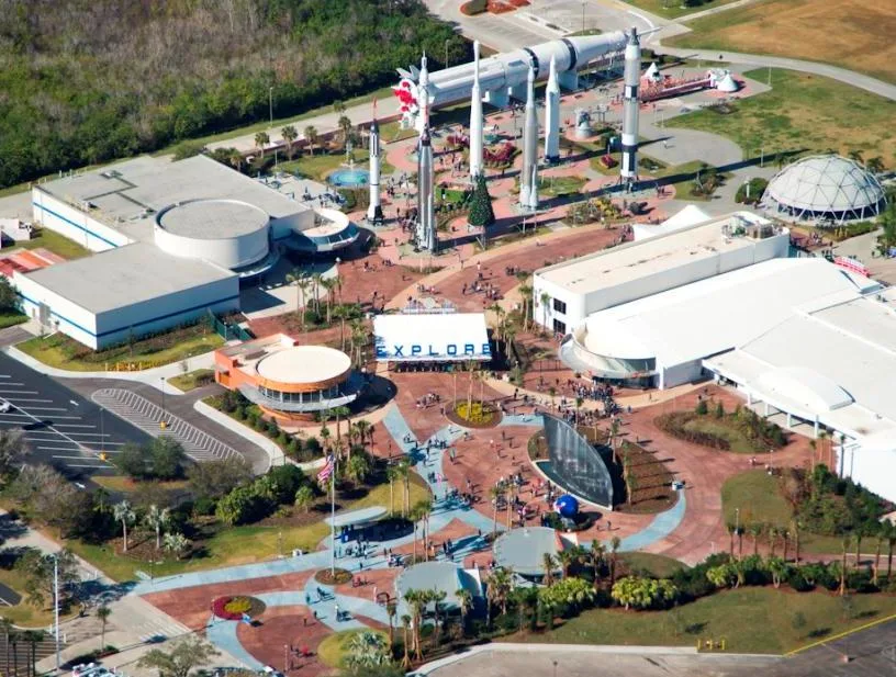 Aerial view of Kennedy Space Center Visitor Complex featuring the Rocket Garden and new entry