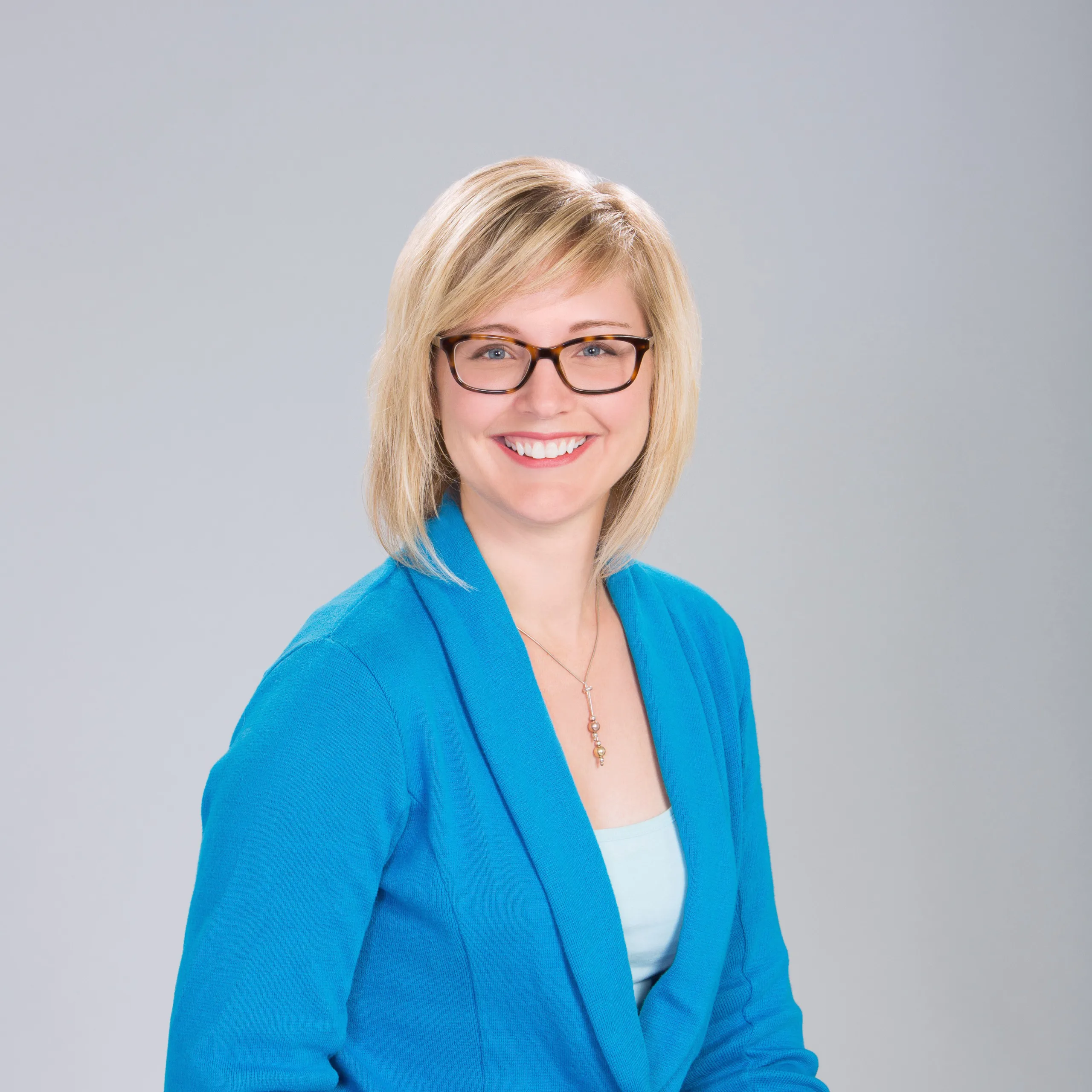 Headshot of Stacey Ludlum of PGAV Destinations, presenter at the zoo design conference in Poland