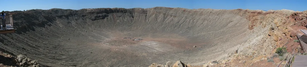 Panoramic view of the vast bowl of Meteor Crater in the Arizona desert