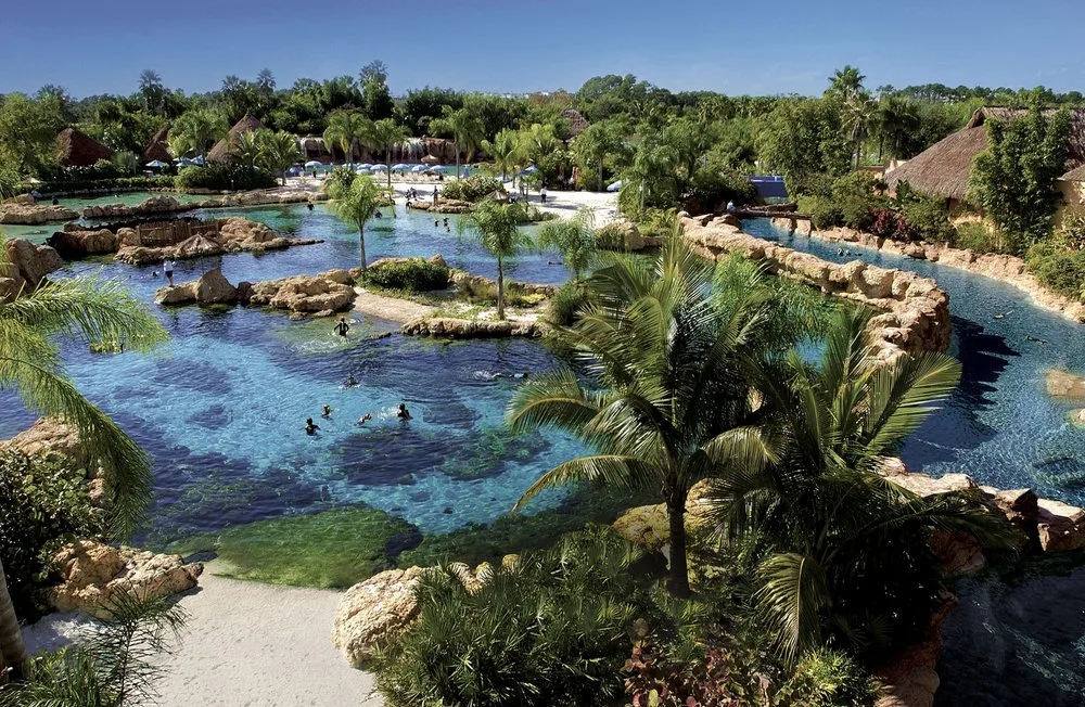 Aerial view of tropical lagoons, rockwork and palms at Discovery Cove in Orlando