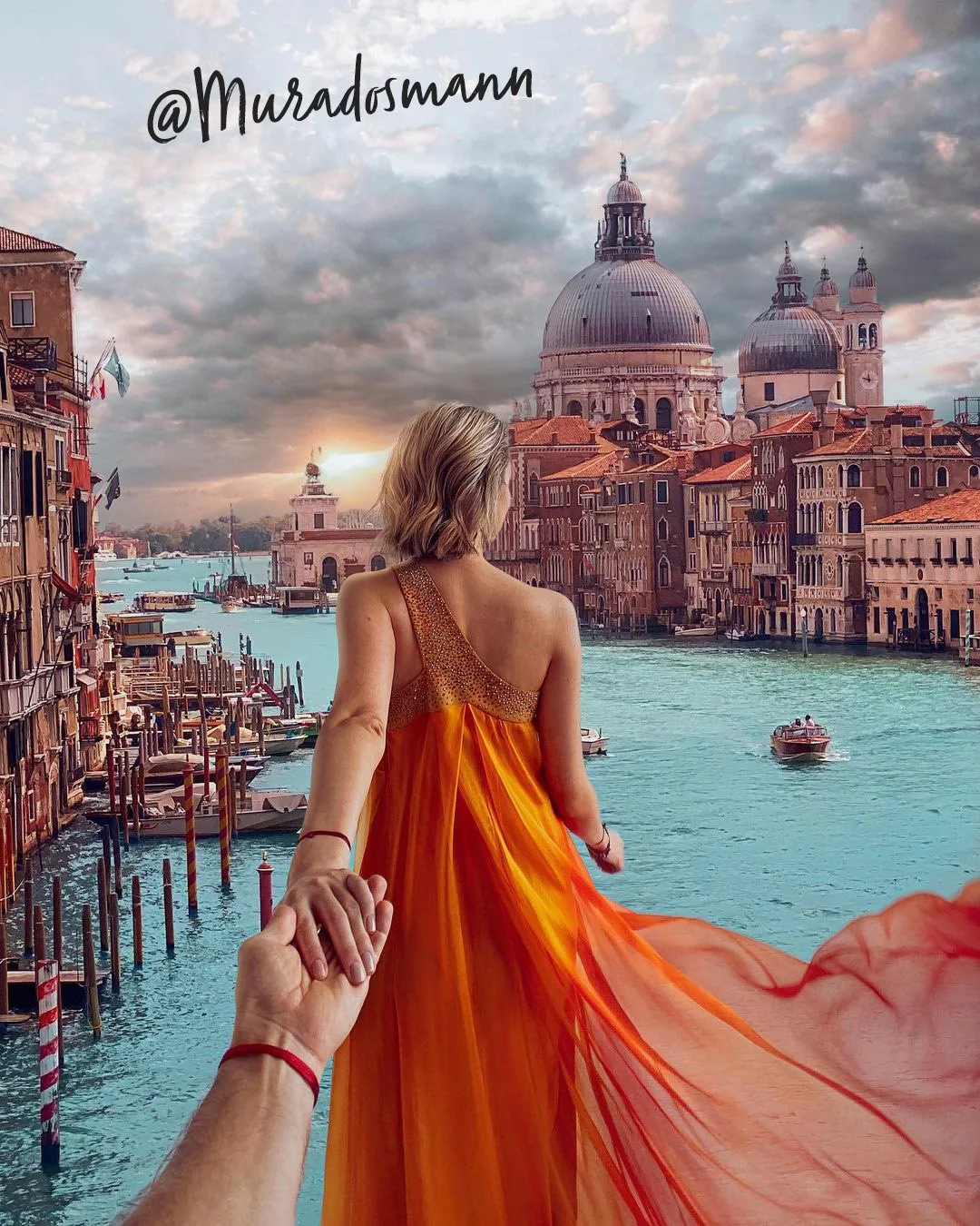 Muradosmann follow-me photo of a woman in an orange gown leading the way above the Grand Canal in Venice