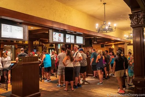Crowd of guests waiting at a busy counter-service restaurant at Walt Disney World