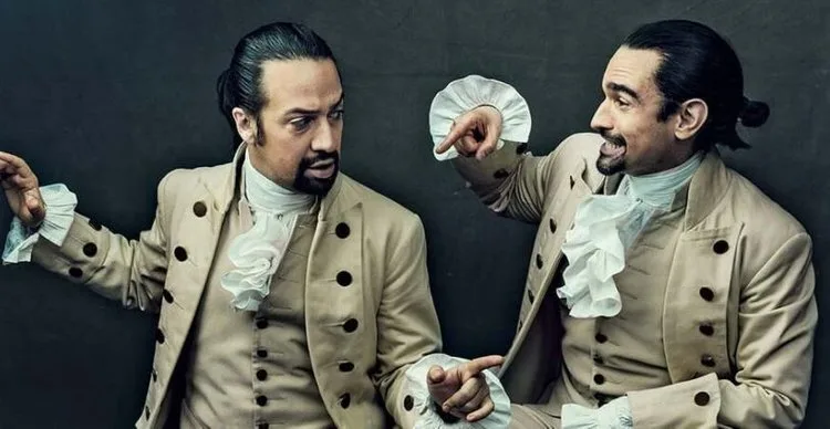 Lin-Manuel Miranda and Javier Muñoz, both costumed as Alexander Hamilton, facing each other