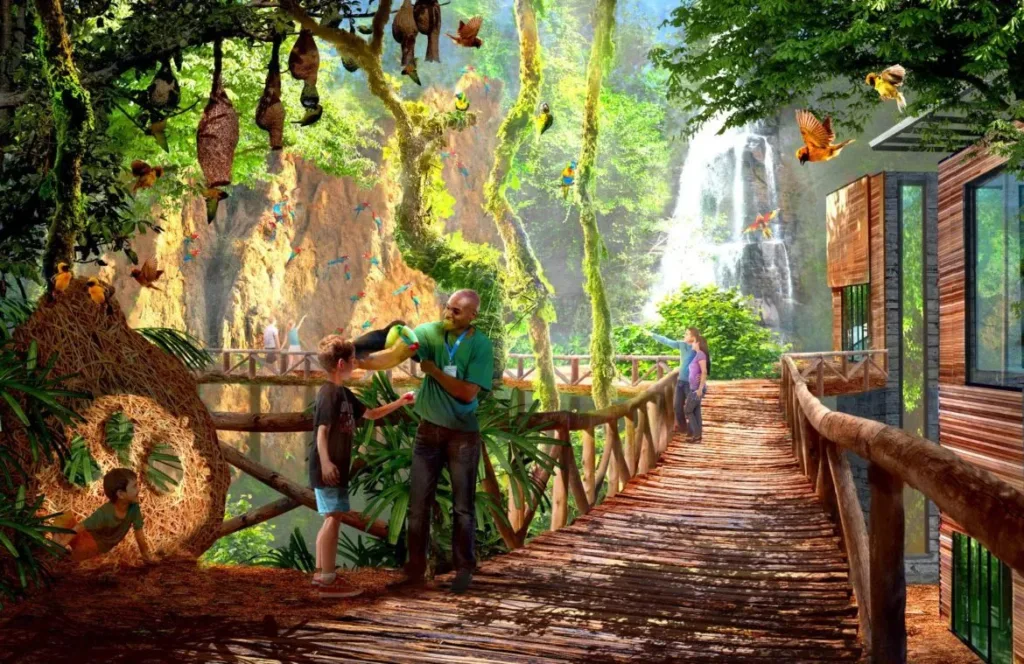 Rendering of a jungle boardwalk with bats, birds and a waterfall where a keeper engages children at San Antonio Zoo