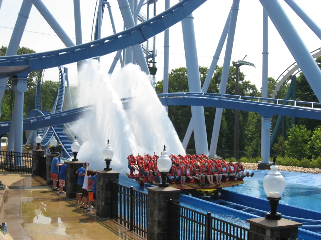 Griffon dive coaster splashing down and spraying water near guests at Busch Gardens Williamsburg