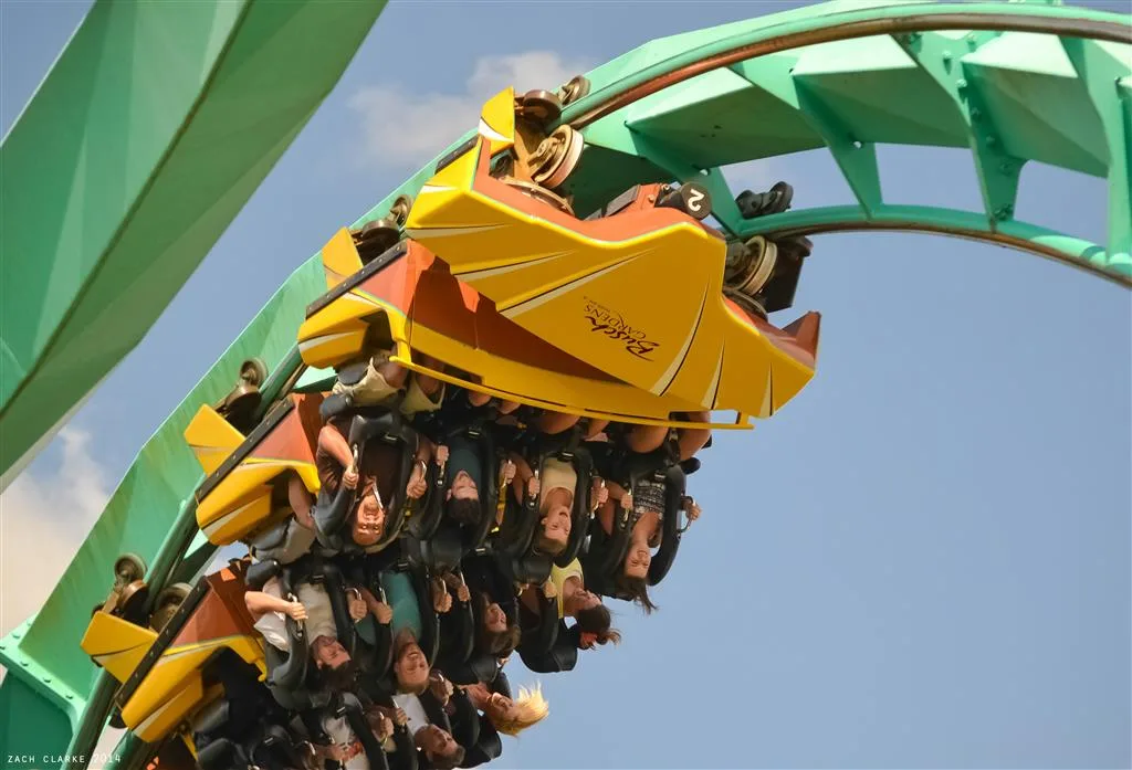 Close-up of riders upside down on Kumba's yellow trains at Busch Gardens Tampa