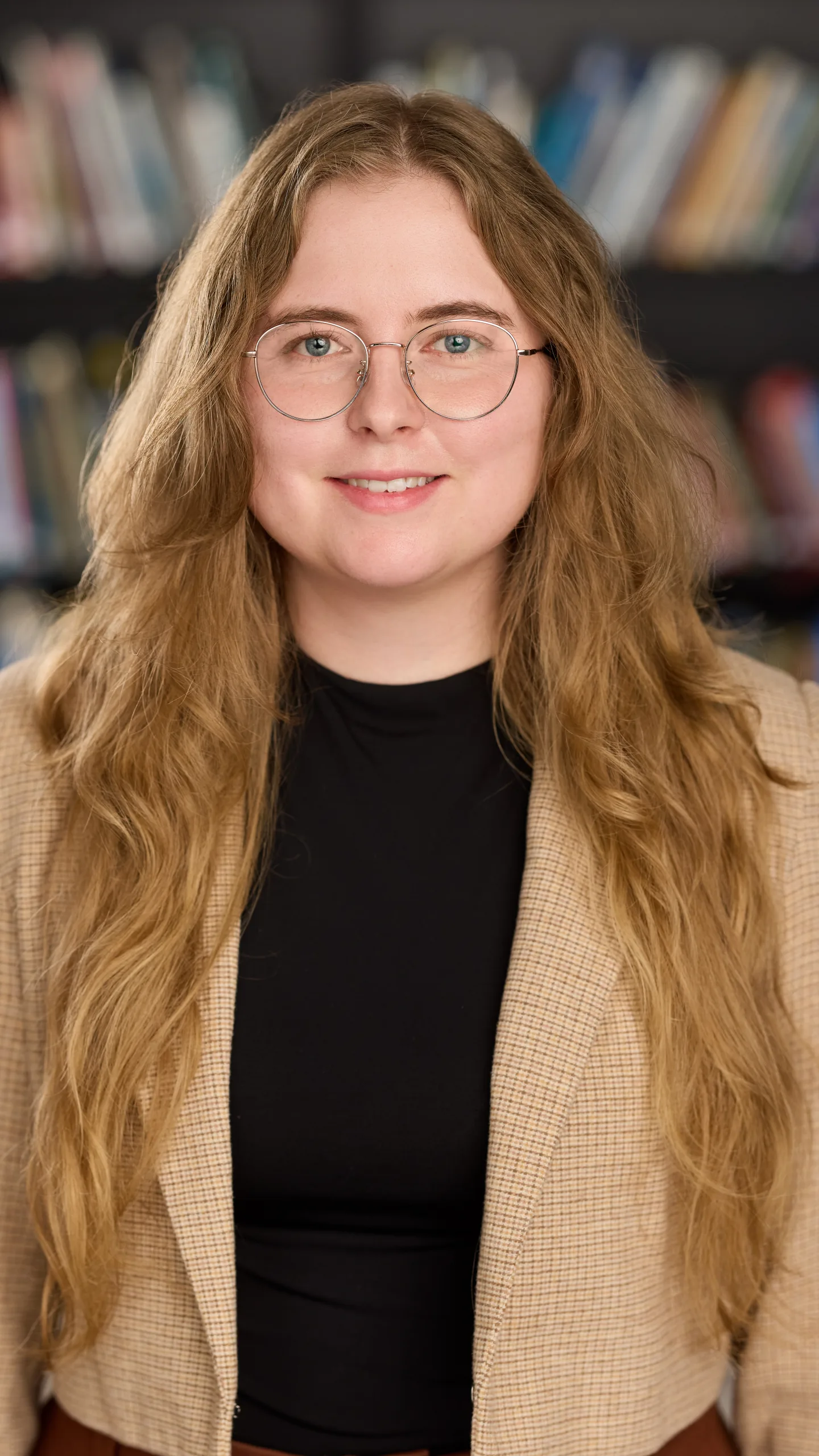Headshot of Madison Bowman, Project Designer at PGAV Destinations